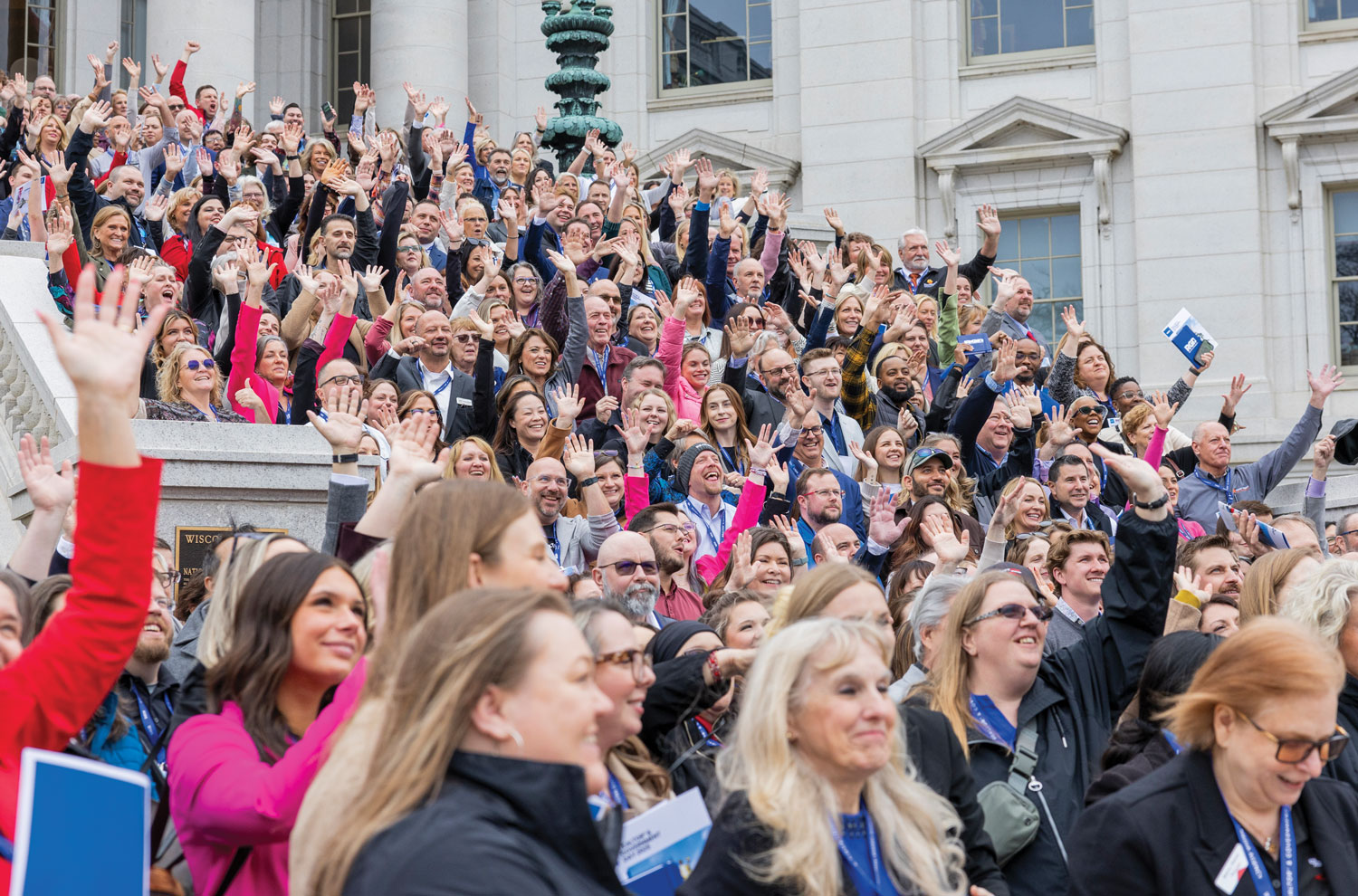 Realtor crowd at Wisconsin capitol building staircase